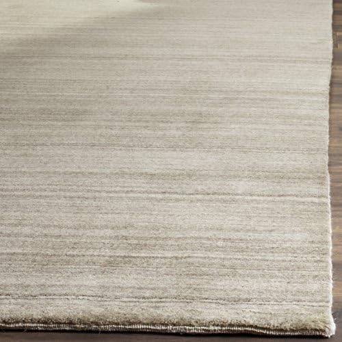 safavieh himalaya collection x-large area rug - 11' on a desk or shelf