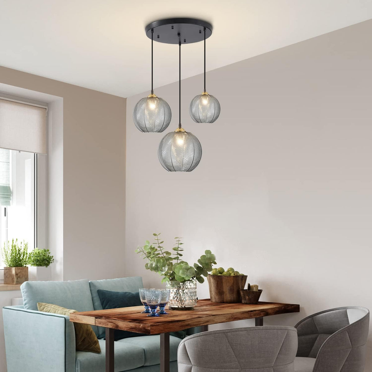 kco modern black 3-light smoke gray glass globe on a desk or shelf