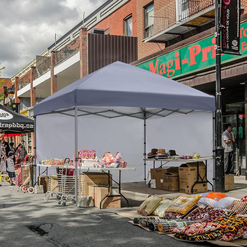 cooshade pop up canopy tent with 2 sidewalls on a desk or shelf