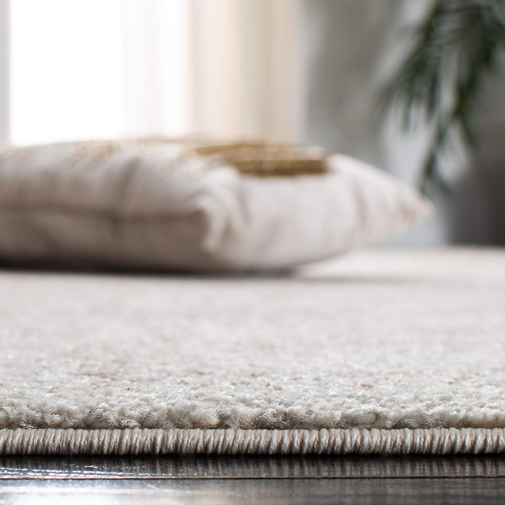 SAFAVIEH Evoke Area Rug 8x10, Large Ivory & Taupe EVK256E