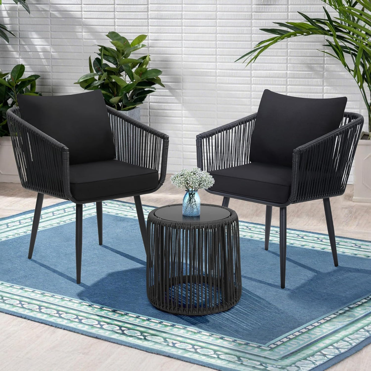 kromax 3-piece patio rattan bistro conversation set, black shown in use