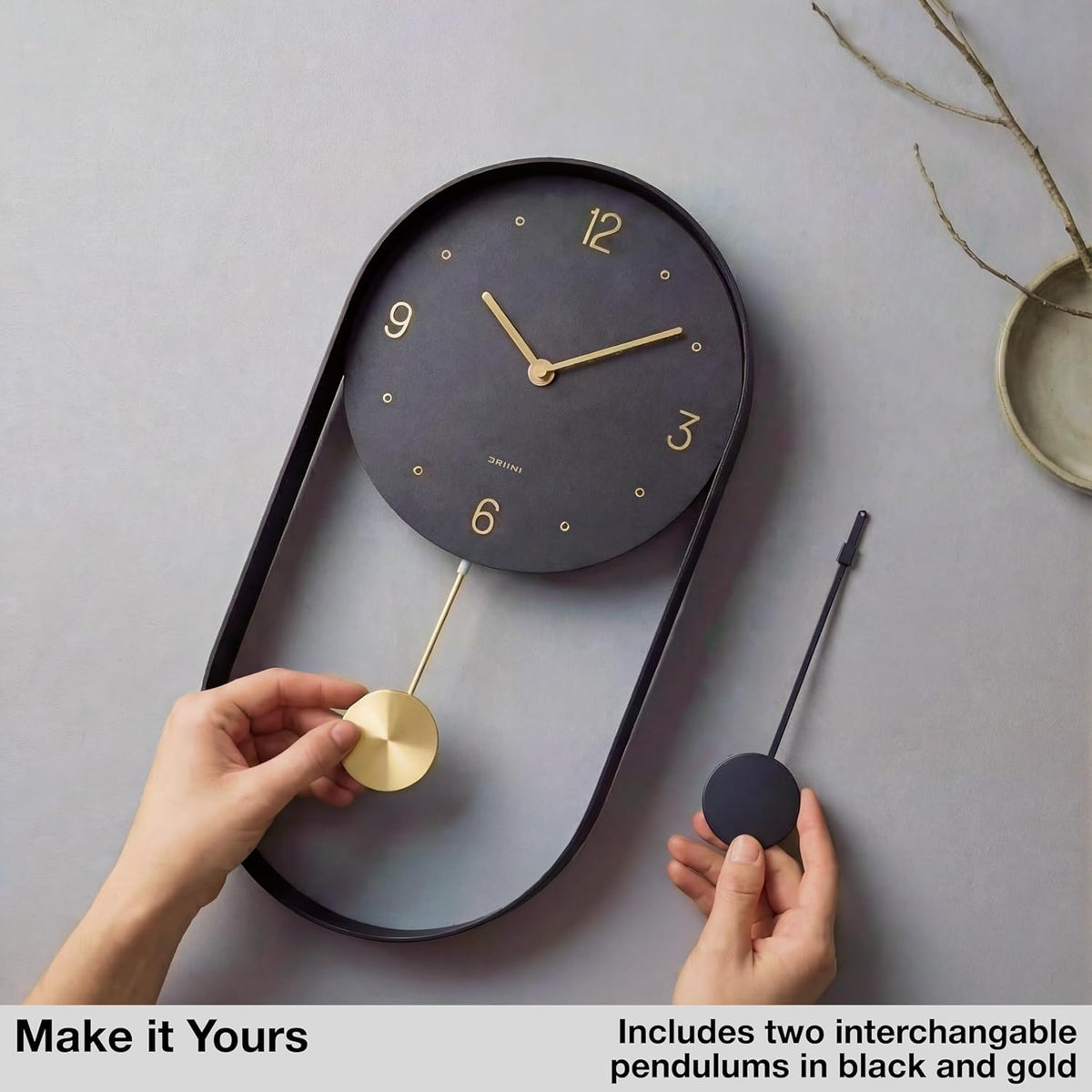 Driini Modern Pendulum Wall Clock – Small Vertical Design in Black and Gold