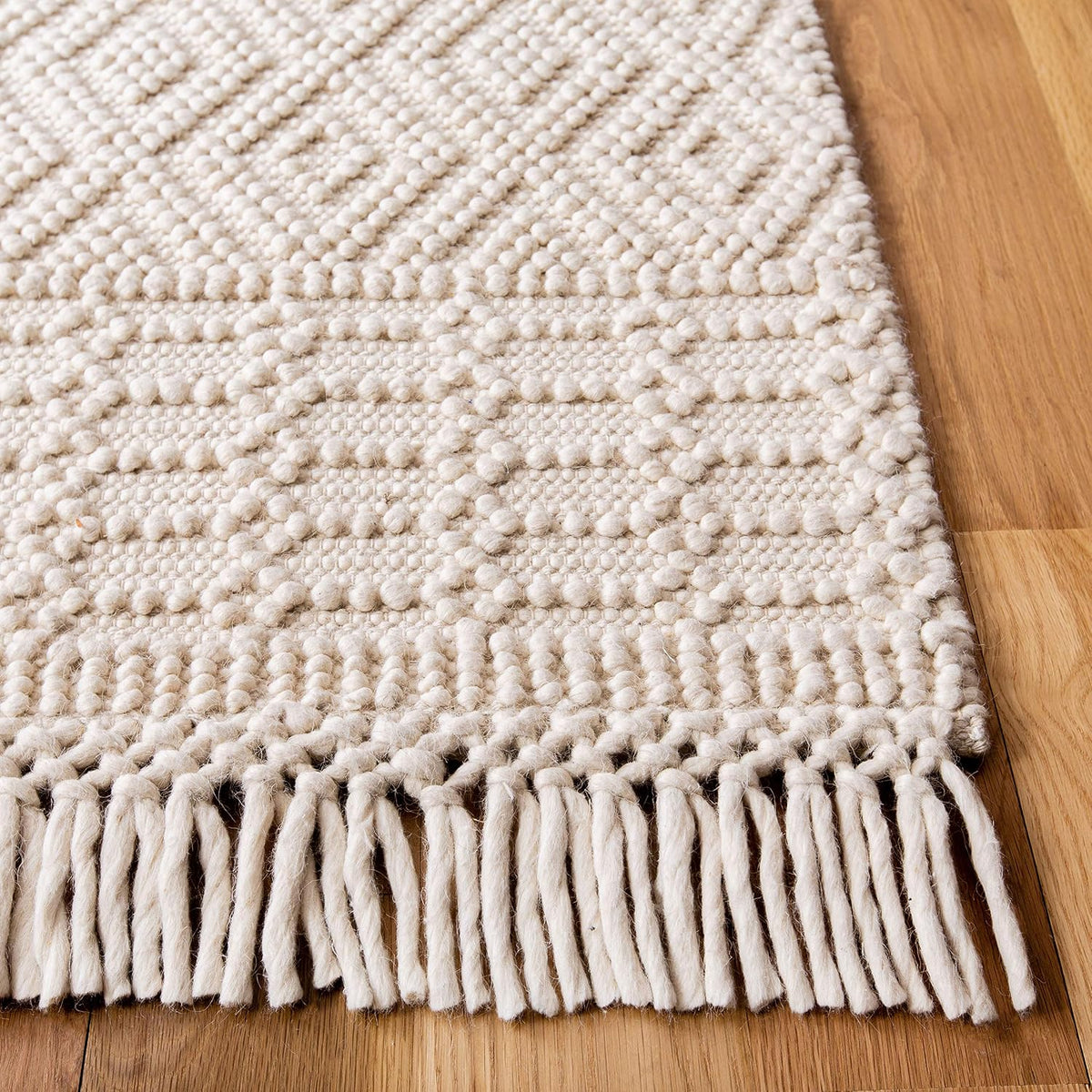 SAFAVIEH Natura Collection Area Rug - 10' x 14', Ivory, Handmade Moroccan Boho Wool Fringe, Ideal for High Traffic Areas in Living Room, Bedroom (NAT852B)