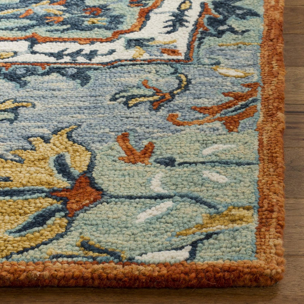 SAFAVIEH Aspen Collection Accent Rug - 2'3" x 4', Blue & Rust, Handmade Boho Wool, Ideal for High Traffic Areas in Entryway, Living Room, Bedroom (APN312A)