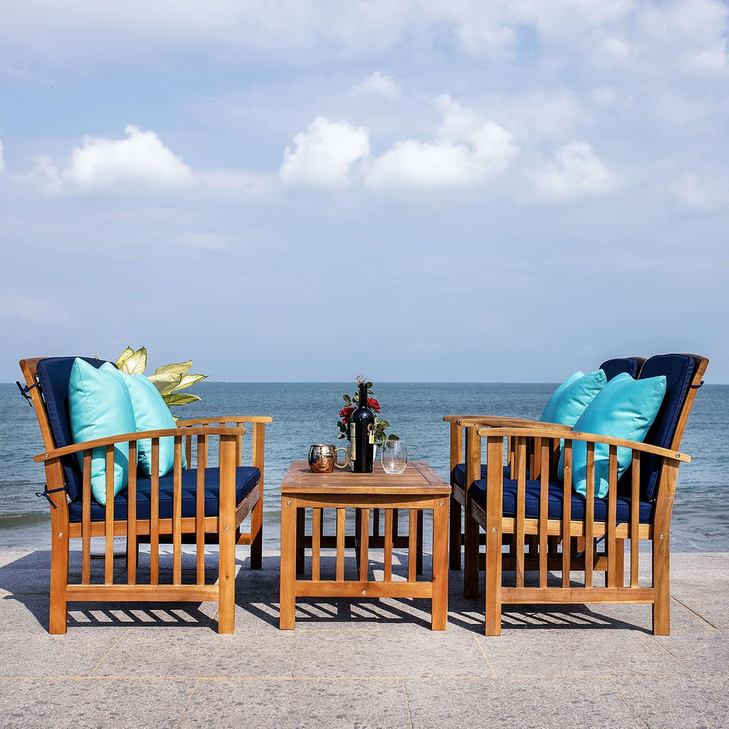 SAFAVIEH Outdoor Collection Rocklin Natural/ Navy Cushions/ Light Blue Pillows 4-Piece Conversation Patio Set