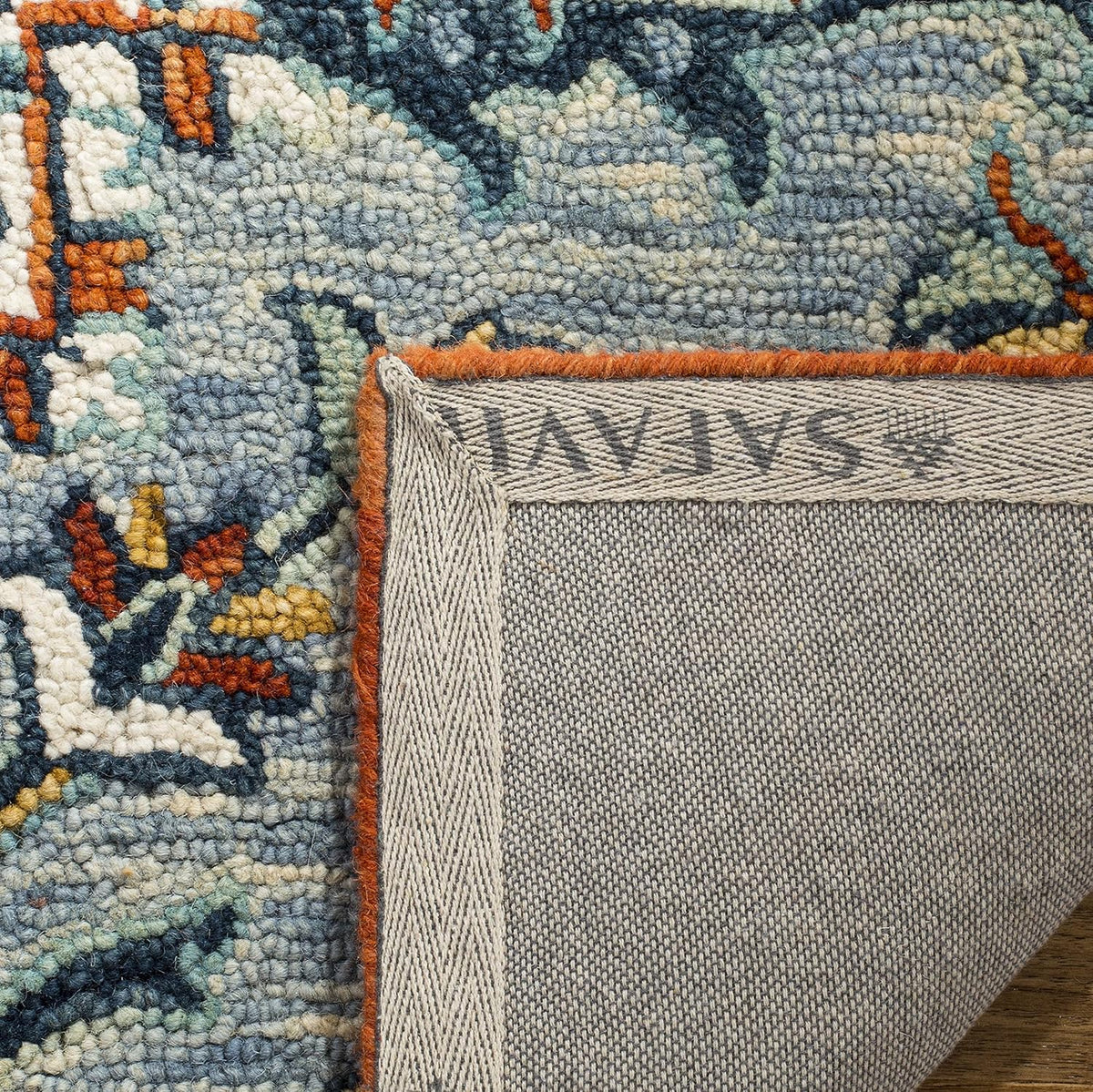 SAFAVIEH Aspen Collection Accent Rug - 2'3" x 4', Blue & Rust, Handmade Boho Wool, Ideal for High Traffic Areas in Entryway, Living Room, Bedroom (APN312A)