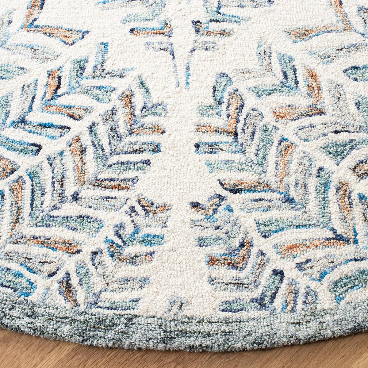SAFAVIEH Capri Collection Area Rug - 12' Round, Ivory & Blue, Handmade Wool, Ideal for High Traffic Areas in Living Room, Bedroom (CPR208A)