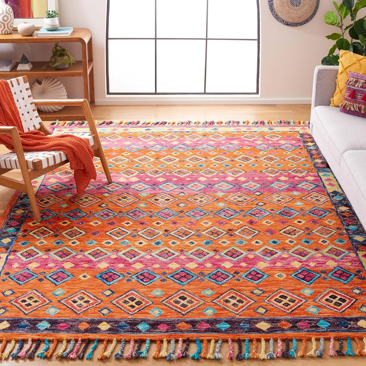 SAFAVIEH Aspen Collection Area Rug - 10' x 14', Orange & Fuchsia, Handmade Boho Braided Tassel Wool, Ideal for High Traffic Areas in Living Room, Bedroom (APN138A)